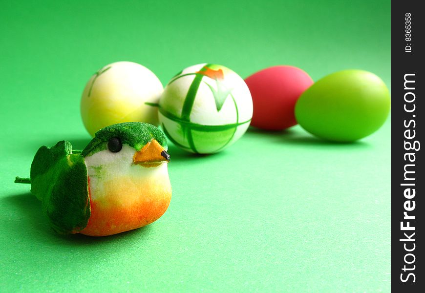 Easter still life, eggs on green background