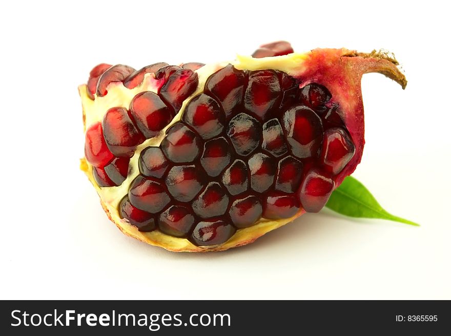 Juicy pomegranate on a white background. Juicy pomegranate on a white background