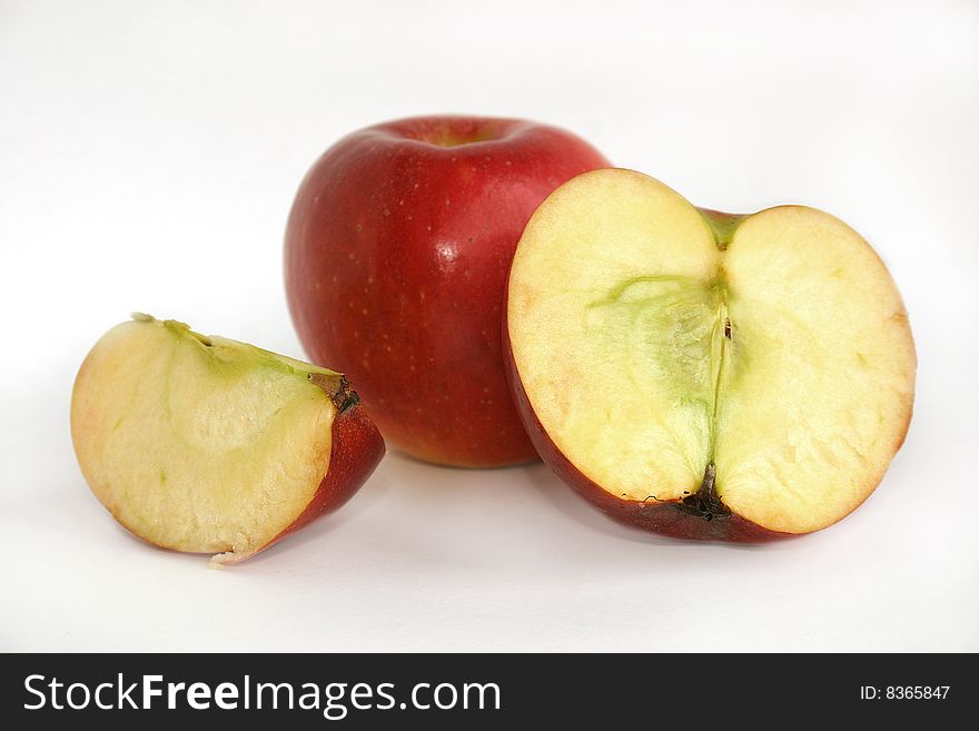 Apples on the white background, close-up. Apples on the white background, close-up
