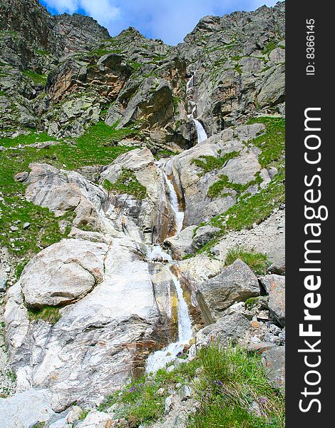 Waterfall in spring season in Caucasus mountains