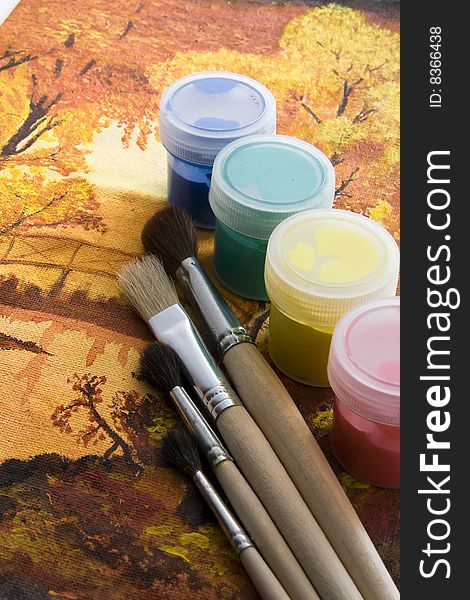 Bright autumn picture with paintbrush