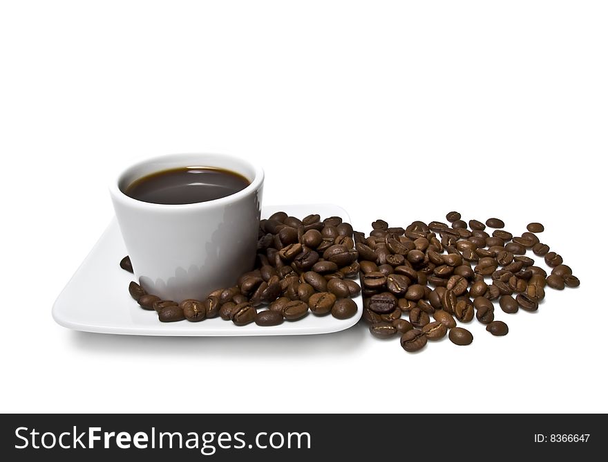 Cup of coffee with coffee grain on a white background