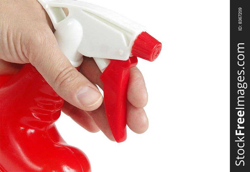 Red sprayer  in hand