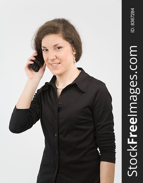 Photo of pretty smiling woman with phone. Photo of pretty smiling woman with phone