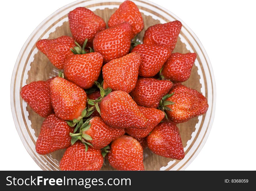 A bowl fill of fresh strawberries.  The bowl has been isolated from the background. . A bowl fill of fresh strawberries.  The bowl has been isolated from the background.