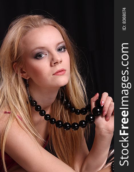 Beautiful blond fashion model posing in studio. Beautiful blond fashion model posing in studio