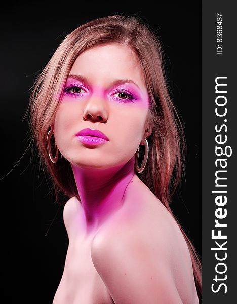 Portrait of beautiful woman with color make-up