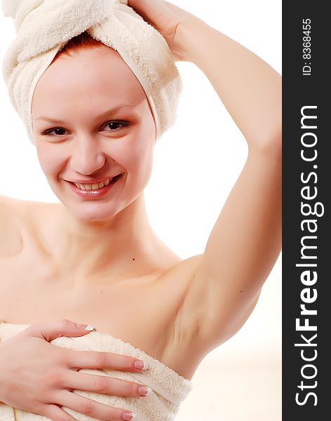 Portrait of beautiful woman in white towels