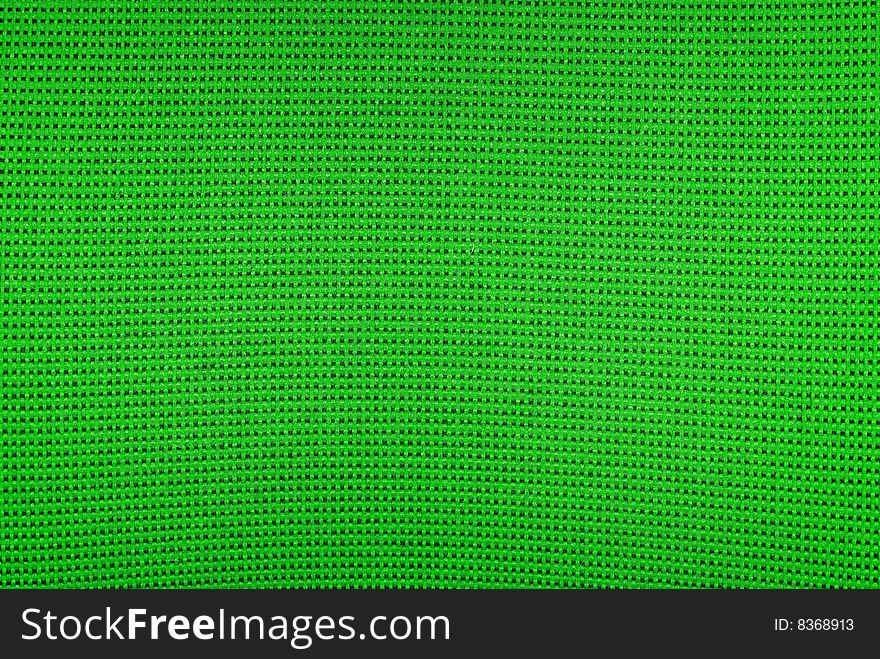 Green textile textured background with rough threads. Green textile textured background with rough threads