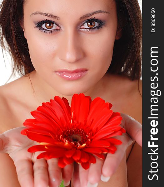 Portrait of a beautiful woman with red flower. Portrait of a beautiful woman with red flower