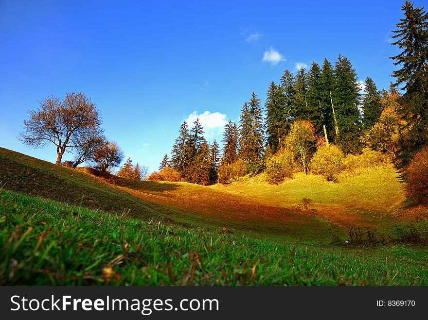 Mountain and Field and deep blue sky