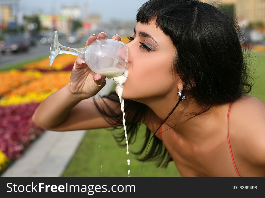 Lovely girl milk in hot summer. Lovely girl milk in hot summer