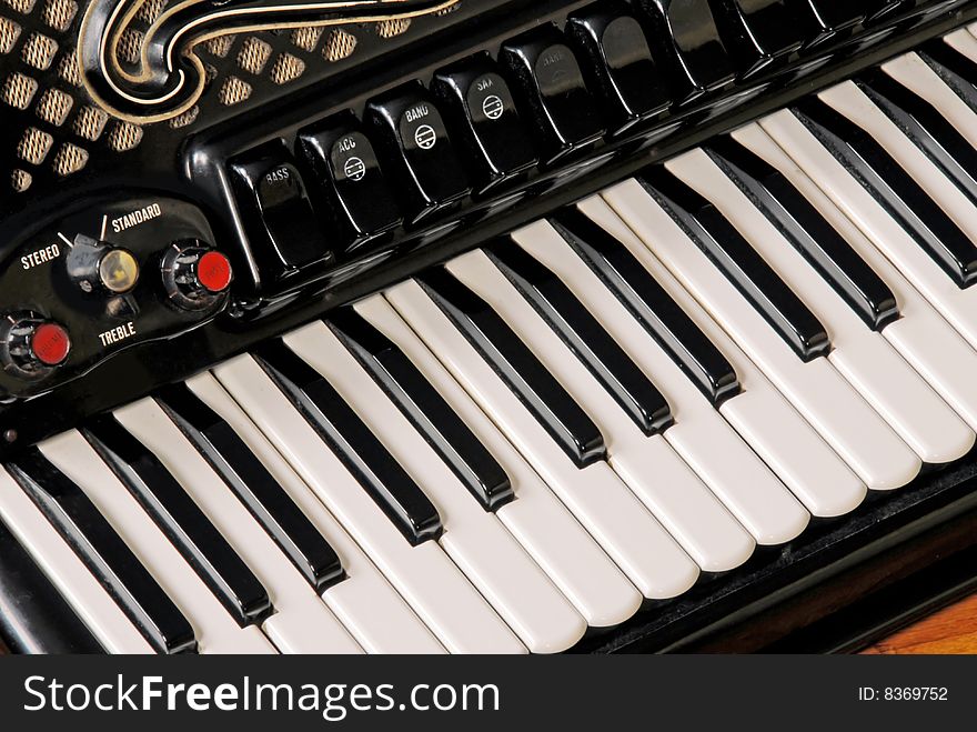 Keyboard of used accordion abstract diagonal background. Keyboard of used accordion abstract diagonal background