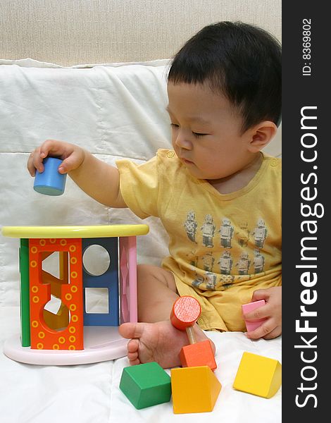 Cute Child playing blocks