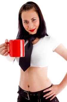 Beautiful Young Woman Showing Red Coffee Cup Royalty Free Stock Images Beautiful Young Woman Showing Red Coffee Cup Royalty Free Stock Images