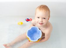 Baby In Bath With Toys Royalty Free Stock Photography