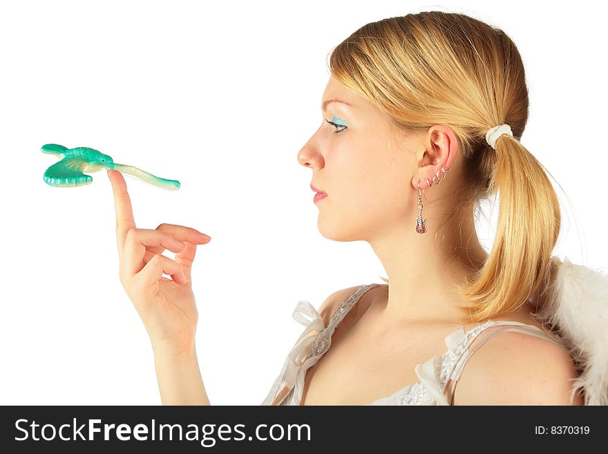 Portrait of girl in angel's costume with toy bird on finger. Portrait of girl in angel's costume with toy bird on finger