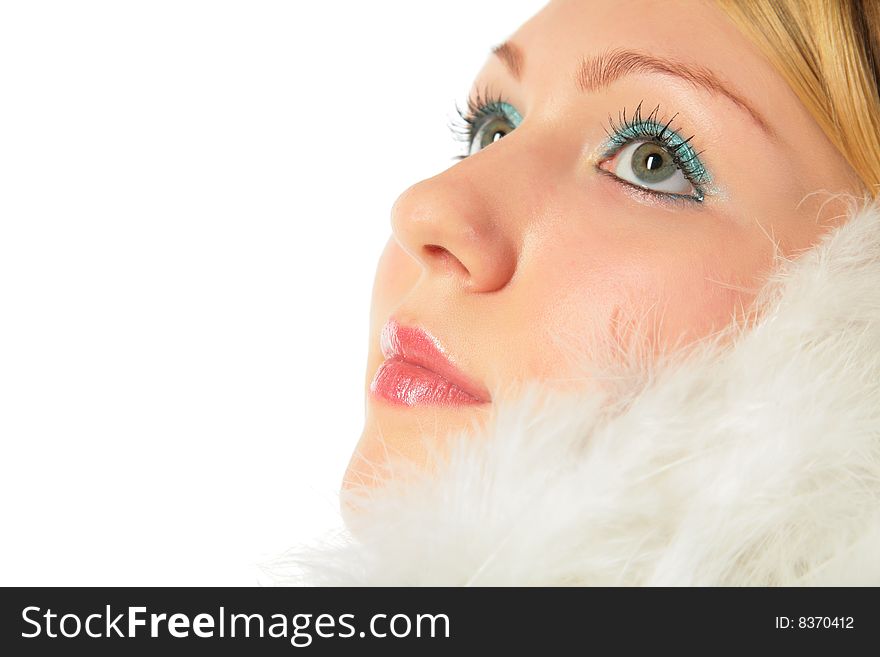 Close-up portrait of blonde  girl in angel's costume on white background