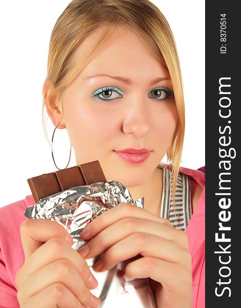 Young girl with chocolate on white background