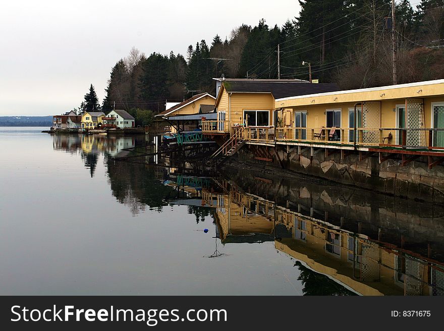 Beach Houses And Reflections