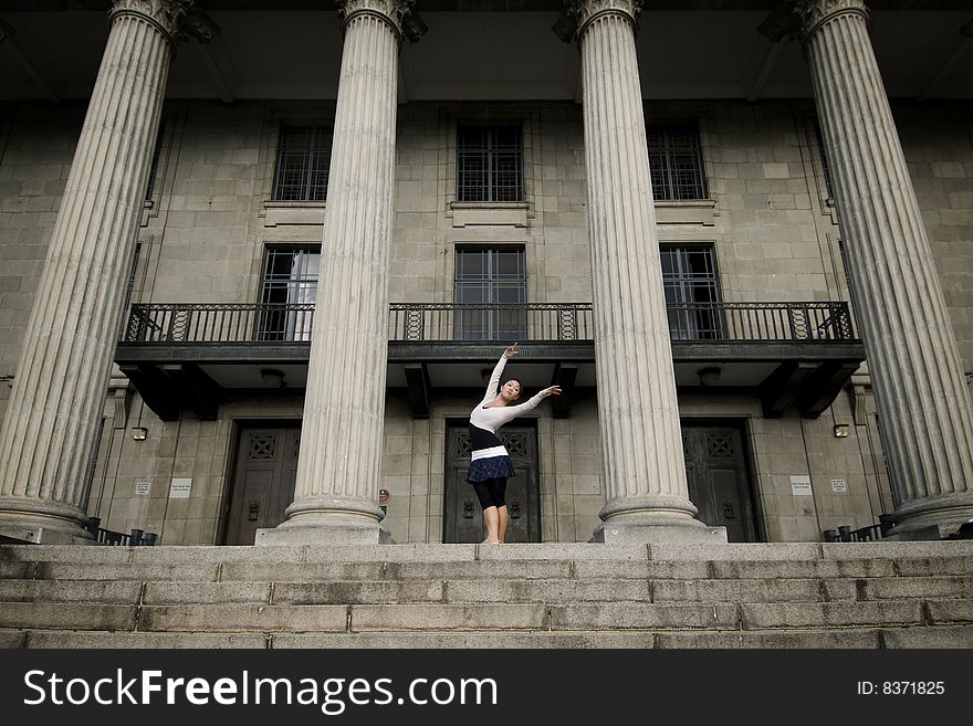 A female dancer dancing in the outdoors. A female dancer dancing in the outdoors