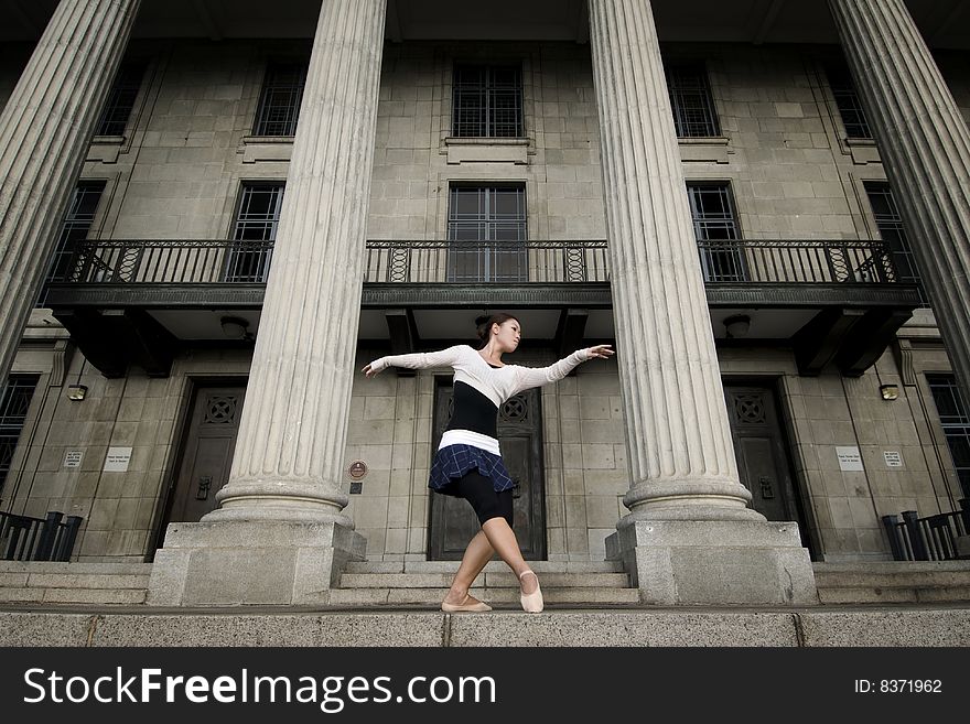 A female dancer dancing in the outdoors. A female dancer dancing in the outdoors