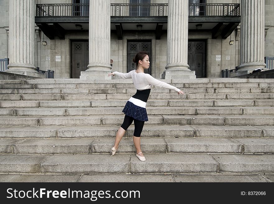 A female dancer dancing in the outdoors. A female dancer dancing in the outdoors