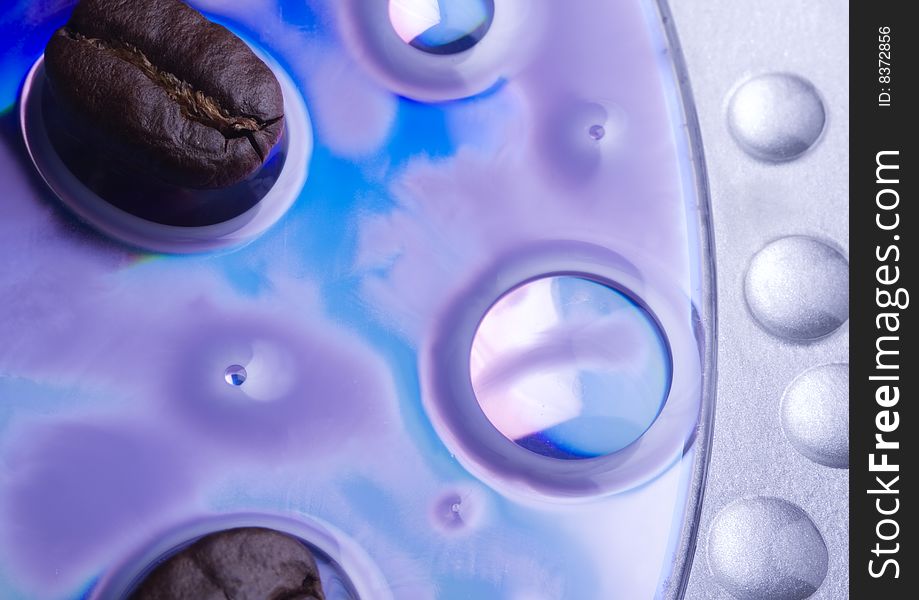 Coffee bean and water drops