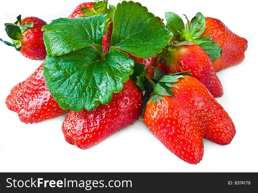 isolated fresh ripe strawberry with leaves. isolated fresh ripe strawberry with leaves