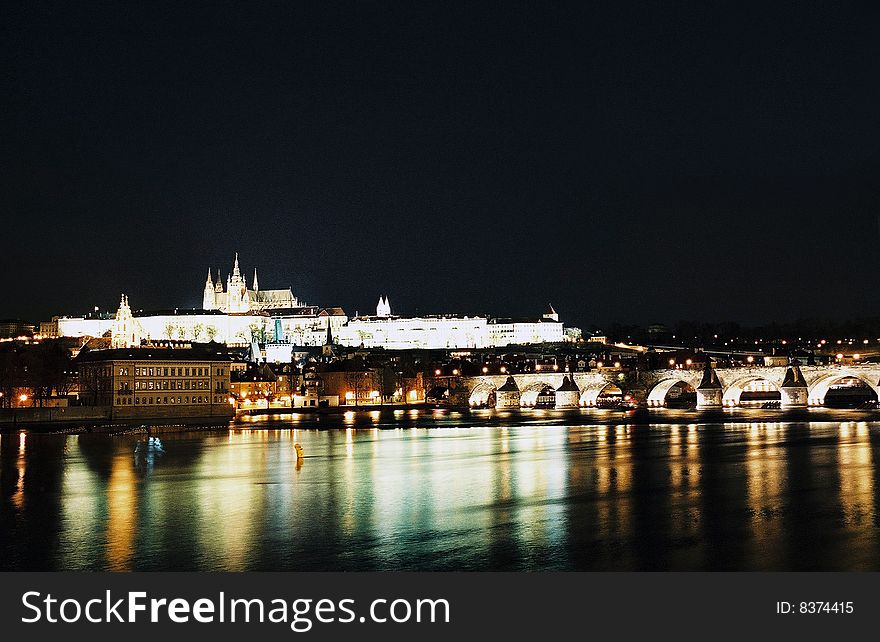 Night sight of Charles Bridge in Prague, and the castle and cathedral to the bottom. Night sight of Charles Bridge in Prague, and the castle and cathedral to the bottom