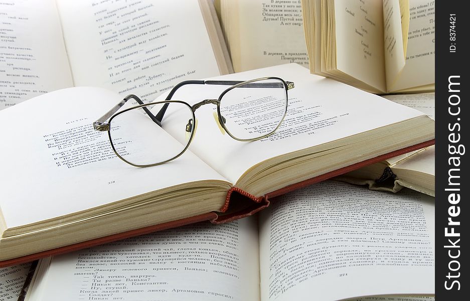 Many Books And Glasses