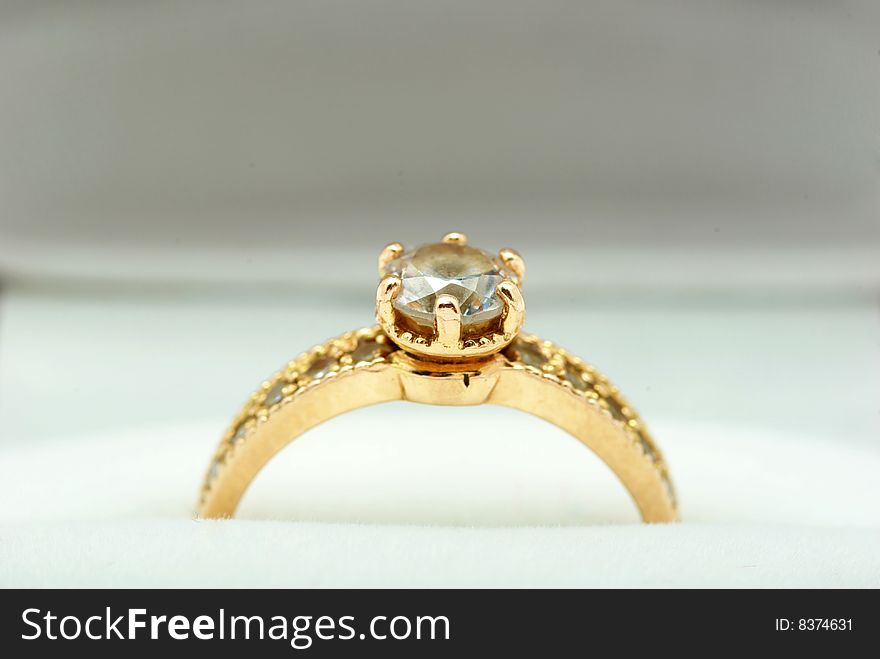 Golden ring isolated on the white background