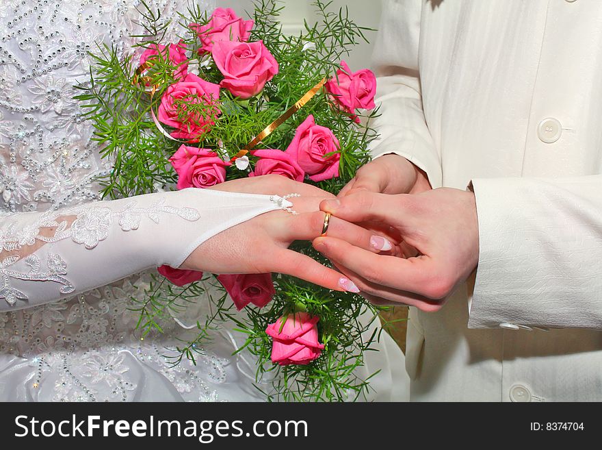 Wedding ring and bouquet for fiance and fiancee