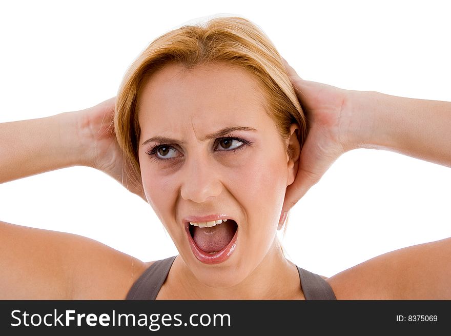 Beautiful woman shouting on an isolated background