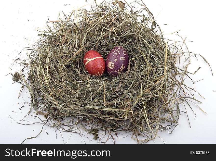 Handmade Colored Easter eggs in the nest