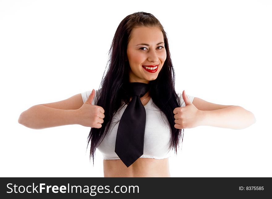 Happy pretty woman posing with thumbs up against white background
