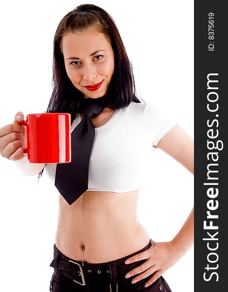 Beautiful young woman showing red coffee cup on an isolated white background