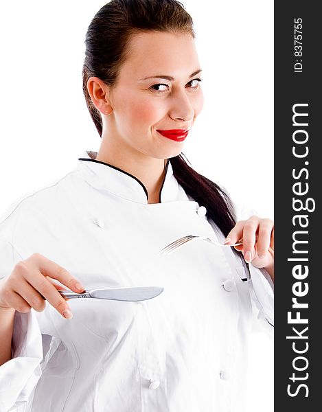 Smart chef holding fork and knife on an isolated white background