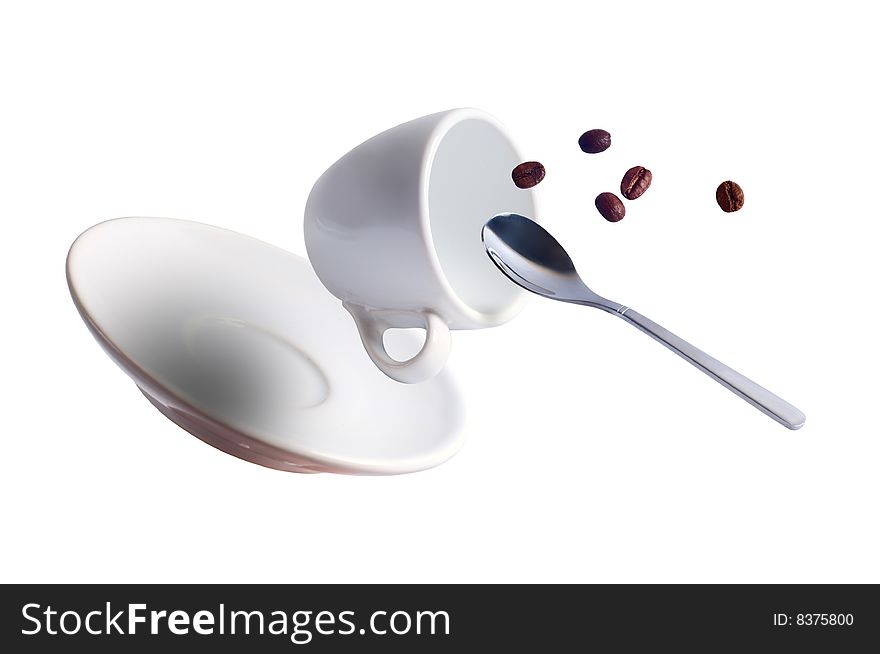 Falling coffee cup with spoon and saucer and beans