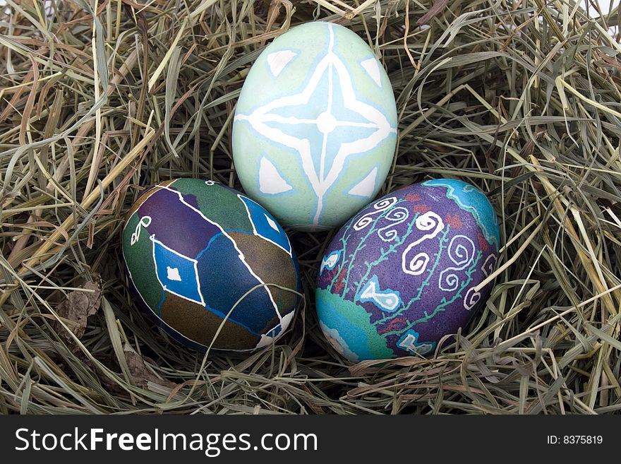 Handmade Colored Easter eggs in the nest