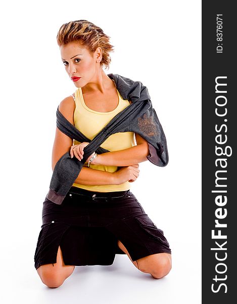 Sexy model posing with jacket against white background