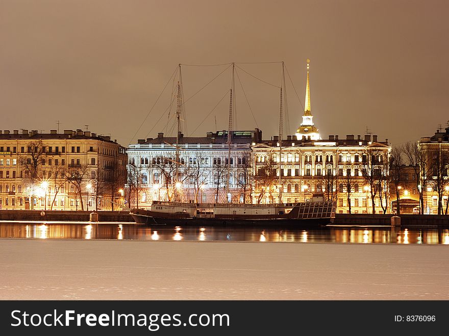 View of Saint-Petersburg in the nighttime; with frozen river on forground