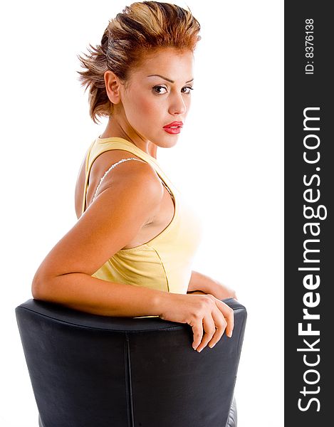 Sitting female looking at camera on an isolated background