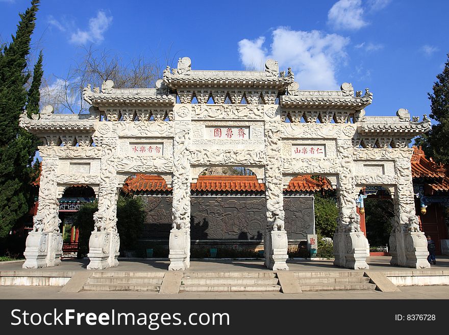 Chinese traditional gate tower with blue sky background