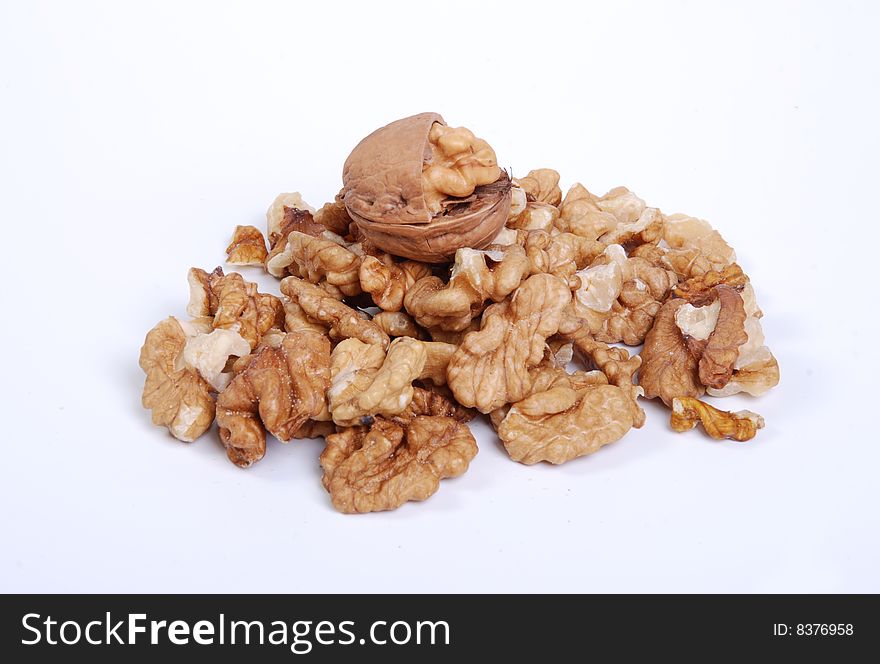 Lot of whole nuts on a white table