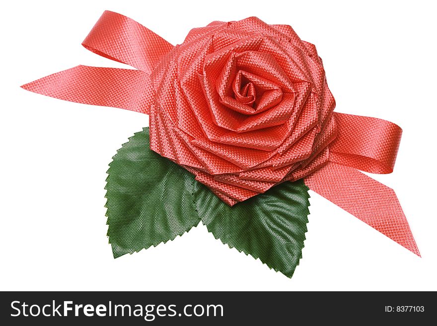 Rose from a tape for an ornament of a gift on white it is isolated. Rose from a tape for an ornament of a gift on white it is isolated