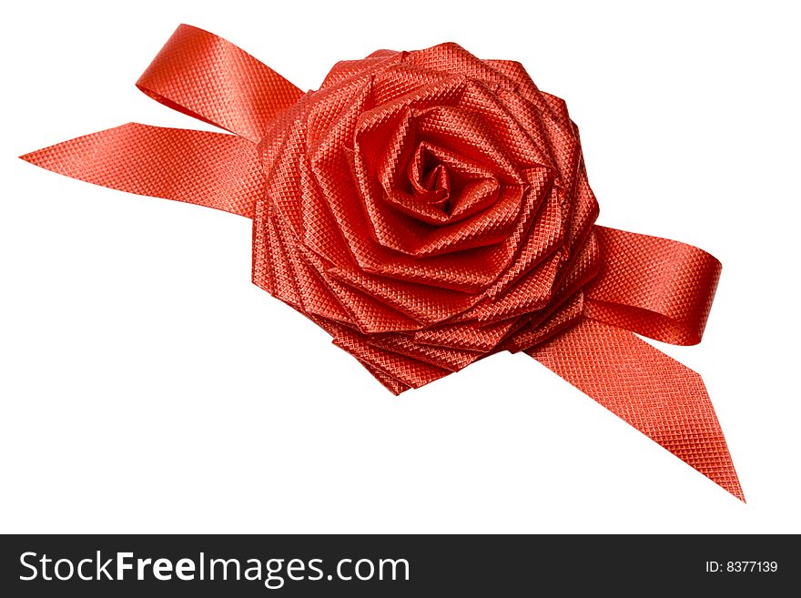 Rose from a tape for an ornament of a gift on white it is isolated. Rose from a tape for an ornament of a gift on white it is isolated