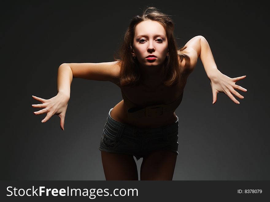 The Woman On A Dark Background