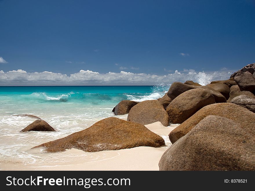 Seychelles stones on the bank of azure ocean. Seychelles stones on the bank of azure ocean