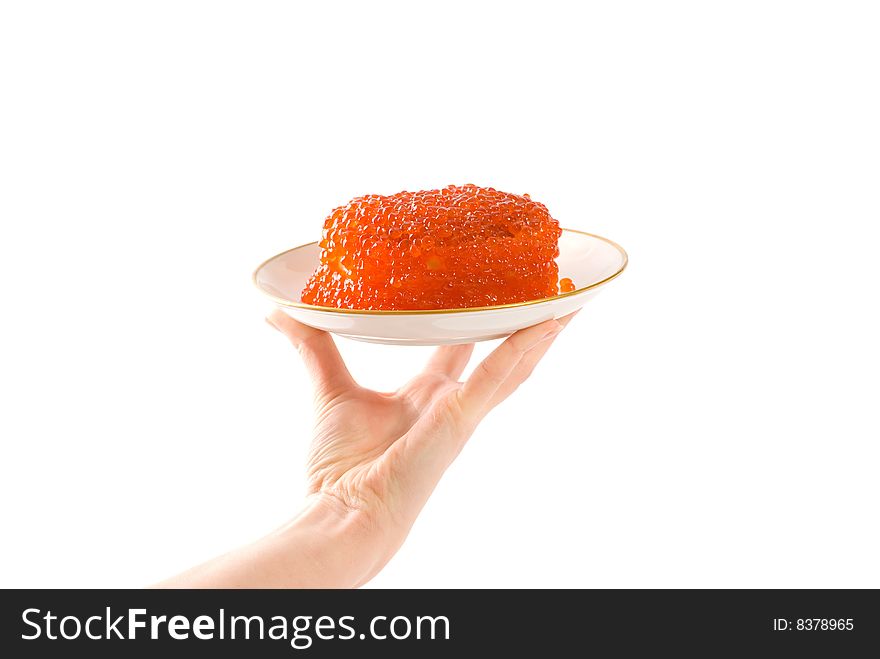 The waitress holds in hands a plate with red caviar isolated on white. The waitress holds in hands a plate with red caviar isolated on white